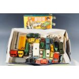 A collection of vintage Dinky and other die-cast toy cars, and the box for a Corgi Toys No 40 "