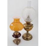 A modified brass oil lamp, 54 cm (a/f) and one other similar, 37 cm (a/f)