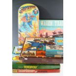 Various vintage games including 'Wagon Train', 'Superman', and Bagatelle etc.