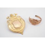 A 9ct gold brooched medallion and a yellow-metal signet ring, (a/f), tests as gold, 6.4g