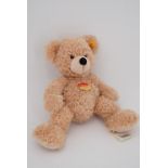 A Steiff 'Fynn 28' Teddy bear, with golden plush, as new, with tags, 28 cm