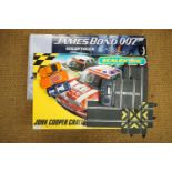 Scalextric James Bond 007 slot car racing set and cars (Aston Martin DB5 missing), together with a