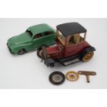 A Schuco tinplate model Ford Coupe T 1917, with key, (a/f), and a Chad Valley clockwork car