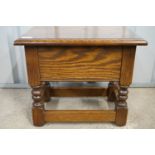 A carved-oak box stool, 46 x 31 x 38 cm high