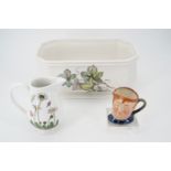 A Royal Doulton character jug, Portmerion Botanical jug and a Royal Winton planter