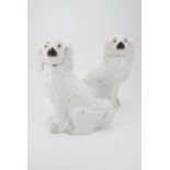 A pair of Staffordshire dogs, 32 cm high