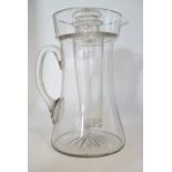 A Victorian cut glass lemonade jug with integral ice vessel, the latter having a ground-in