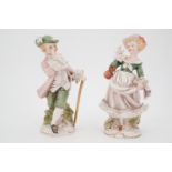 A pair of continental bisque porcelain figures, modelled as a young couple greeting one another,