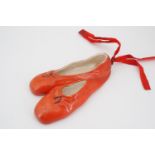 A Brentleigh Ware pottery novelty wall pocket modelled as a pair of red ballet pointe shoes, shape