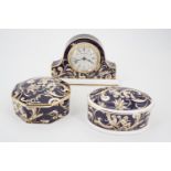 A Wedgwood Bicentenary Celebration "Cornucopia" pattern clock together with two lidded boxes