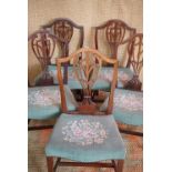 Five Georgian Hepplewhite style mahogany dining chairs