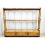 An oak dresser-back / plate rack, 102 x 97 cm high