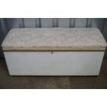 An ottoman / bedding box stool