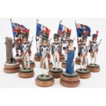 A hand-painted die-cast lead chess set, the pieces modelled as Napoleonic soldiers