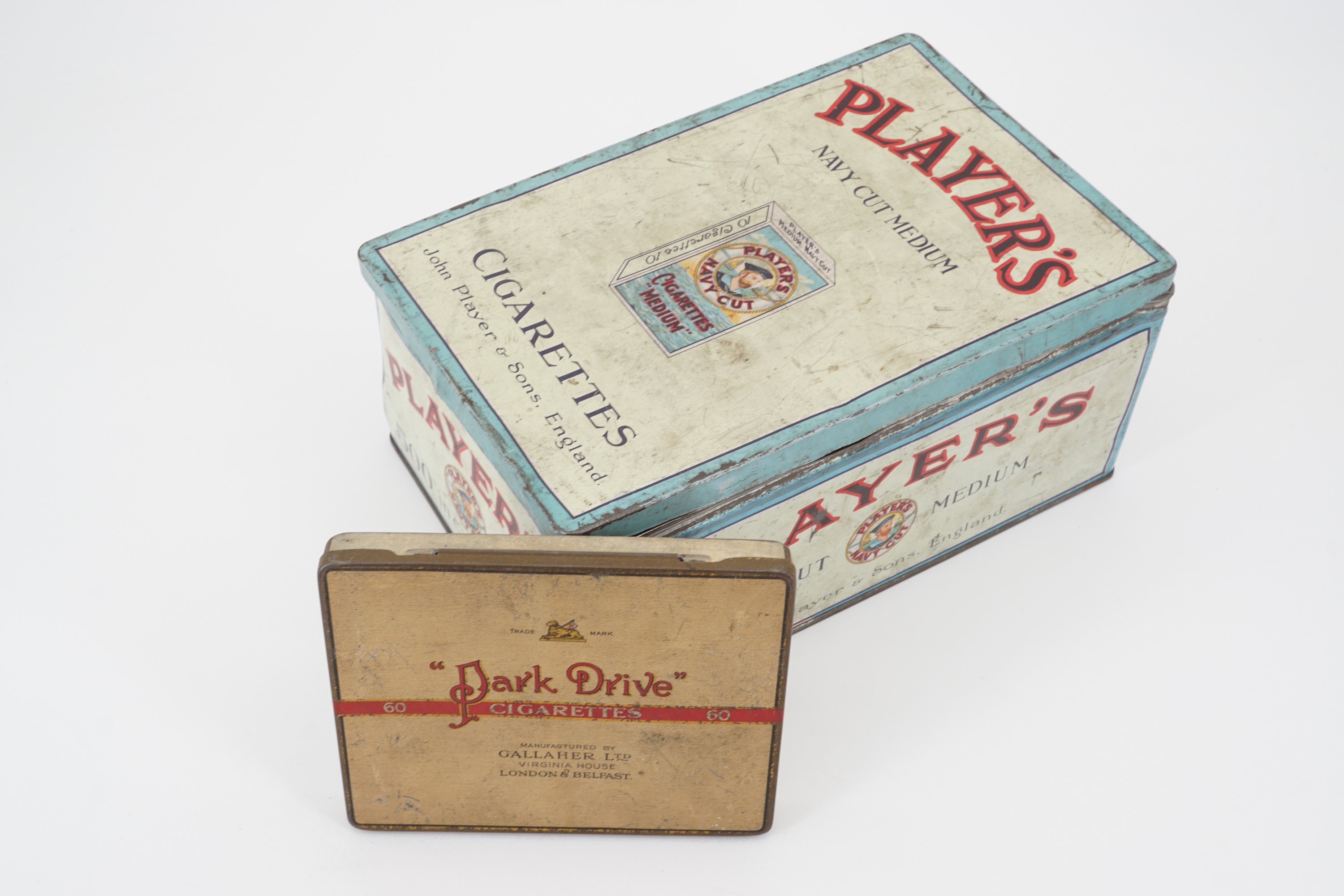 An early 20th Century Player's Navy Cut cigarettes tinplate box together with one other cigarettes