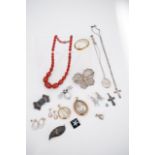 A quantity of vintage silver and costume jewellery, including a filigree butterfly brooch, rolled-