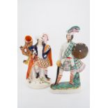 A Staffordshire type figurine of "Wallace", clutching basket hilted sword and targe, 40 cm (a/f),