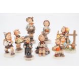 Eight Hummel figurines