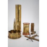 A Second World War "trench art" table cigarette lighter fabricated from a 1942 US shell case, a
