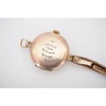 A 1920s lady's rolled-gold wristlet watch, the case back engraved "To Jessie from Mother November