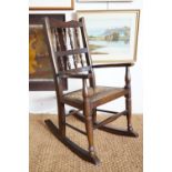 A child's Lancashire style spindle-back rocking chair