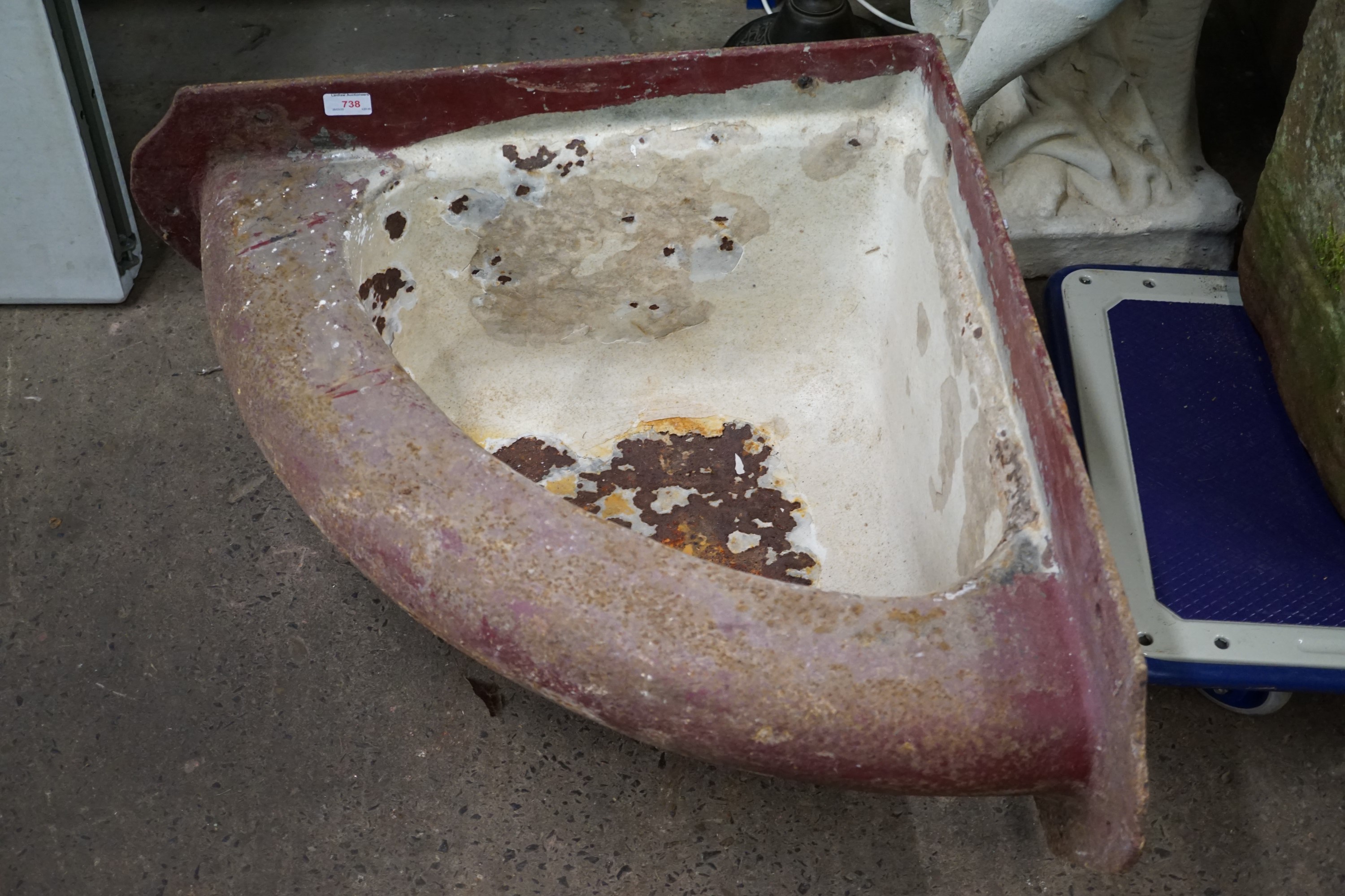 A vintage enamelled iron wall-mounting corner trough, 70 cm x 70 cm