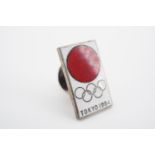 A 1964 Tokyo Olympics enamelled lapel badge