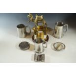 Two pewter tankards, one other, and a brass camel etc
