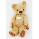 A vintage Teddy bear, with golden mohair, and replacement button eye, 40 cm