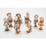 Eight Hummel figurines