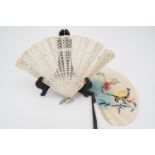 An early 19th Century bone brisé fan (a/f), guard 19 cm, and a Chinese folding paper fan