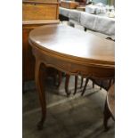 A quality late 20th Century Louis XV style carved walnut demi-lune side table cum dining table,