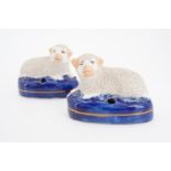 Two small Staffordshire type earthenware sheep