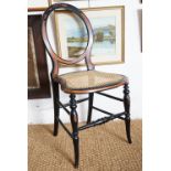 A Victorian ebonized bedroom chair by Betteridge and Co of Birmingham