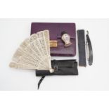 A Victorian ebony manicure set, leather jewellery case, bone brisé fan, cut-throat razor and