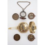 Four various brass compasses / pocket sundials
