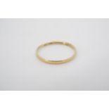 A Victorian 18ct gold wedding band, size R, 1.3g