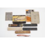 A collection of vintage straight / cut throat razors, a boxed Burman hair clipper and 1920s / 30s