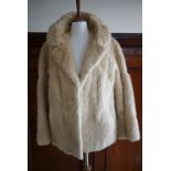 A vintage blonde musquash fur swing jacket retailed by M. Fletcher of Southport, having bracelet