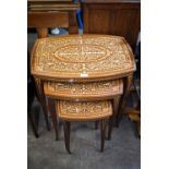 A late 20th Century Italian nest of three inlaid tables