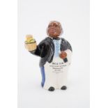 An Uncle Tom Kentucky Bourbon figural decanter by Fraser Son and Mackenzie, 17 cm