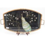 A vintage tea tray with reverse painted and foil decorated glass depicting a peacock, 51 cm,