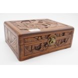 A Chinese carved wooden box, with fitted interior, 25 x 20 x 10 cm