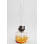 A glass oil lamp, 37 cm