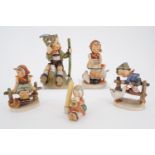Five Hummel figurines including Hiker and Barnyard Hero