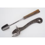 A 19th Century horn-handled steel stilton scoop together with a Bully Beef can opener