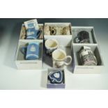A quantity of Wedgwood commemorative and Jasper ware cups together with a trinket box