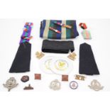 Sundry military and police badges, medal ribbons etc