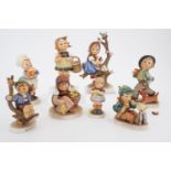 Eight Hummel figurines