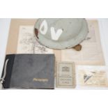 A Second World War British military helmet together with an album of military photographs and sundry